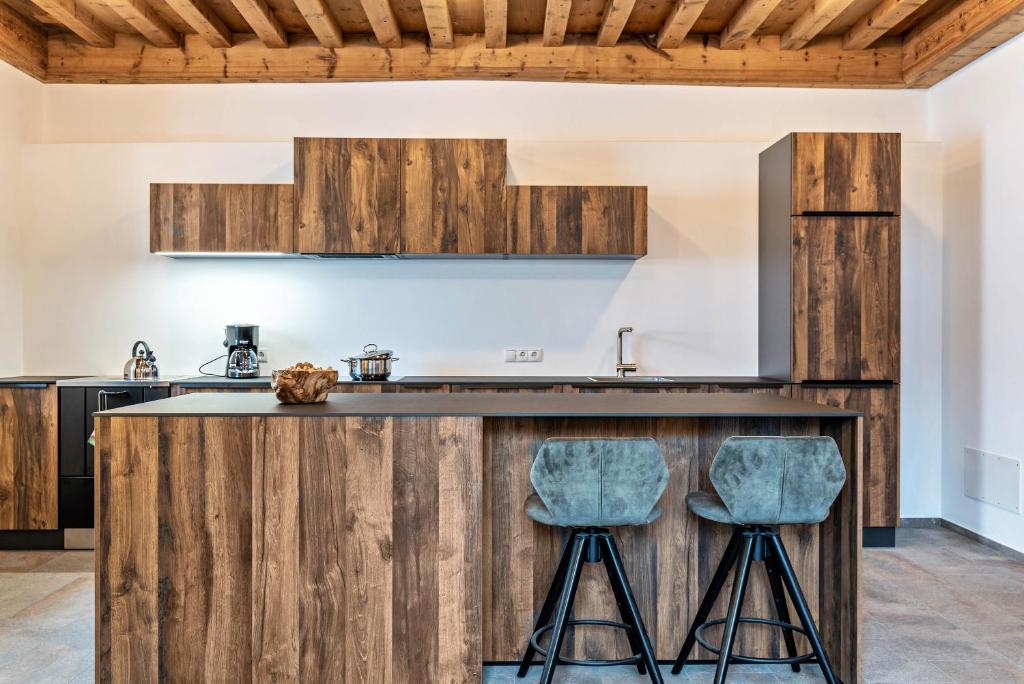 Kuchyň nebo kuchyňský kout v ubytování Alpin Chalet Samer Apt Bauernstube