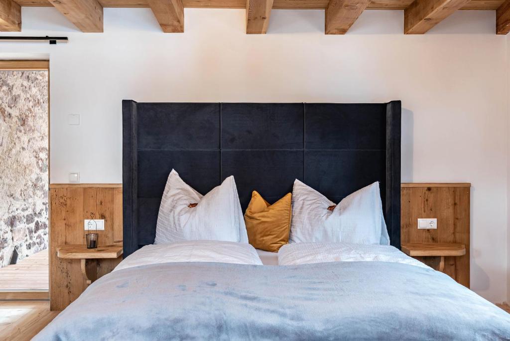 Postel nebo postele na pokoji v ubytování Alpin Chalet Samer Apt Bauernstube