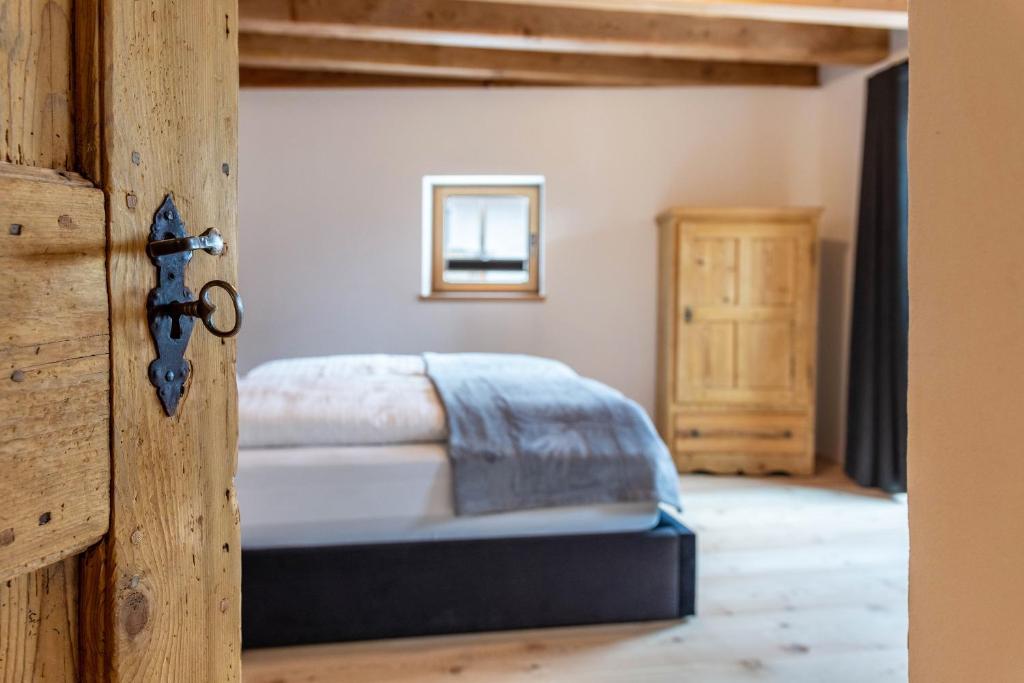 Postel nebo postele na pokoji v ubytování Alpin Chalet Samer Apt Bauernstube