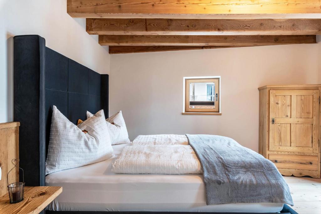 Postel nebo postele na pokoji v ubytování Alpin Chalet Samer Apt Bauernstube