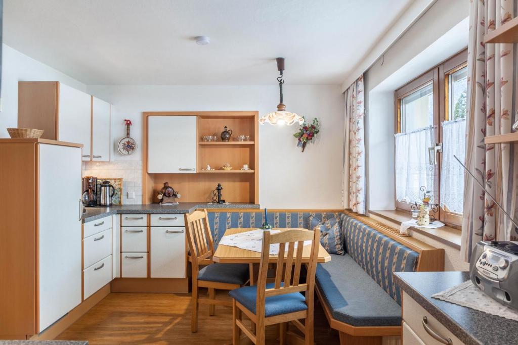 Kuchyň nebo kuchyňský kout v ubytování Gästehaus Gisela 2