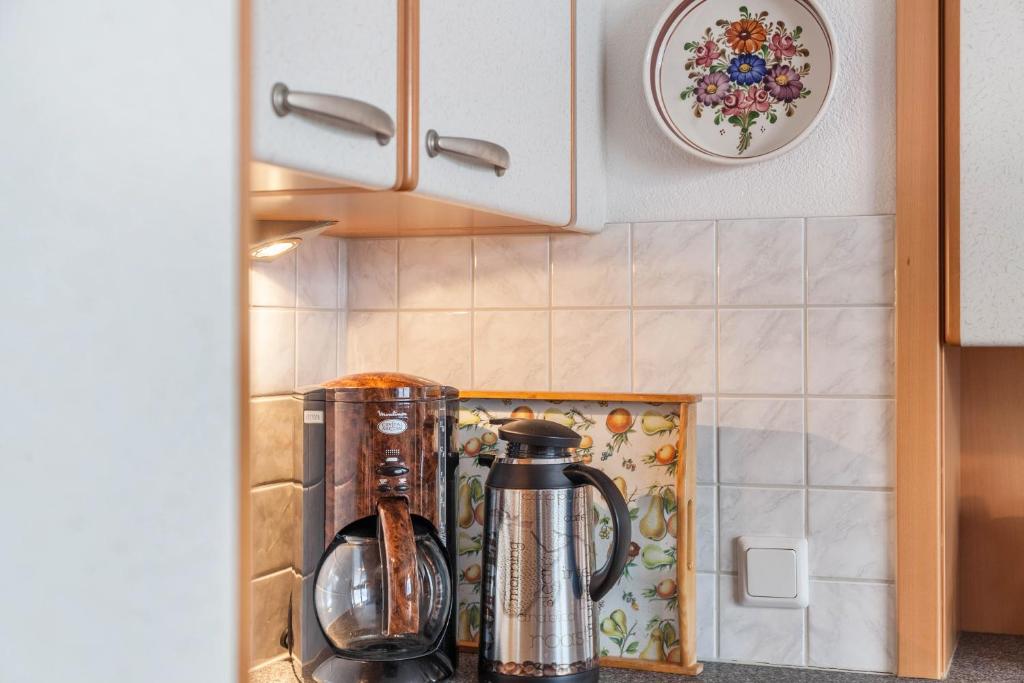 Kuchyň nebo kuchyňský kout v ubytování Gästehaus Gisela 2