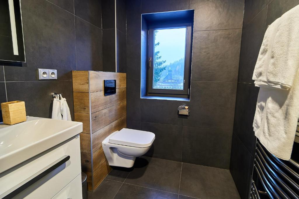 Koupelna v ubytování Apartmány Výsluní