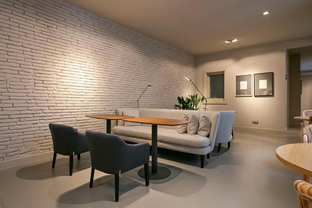 Posezení v ubytování Uma Suites Pau Claris