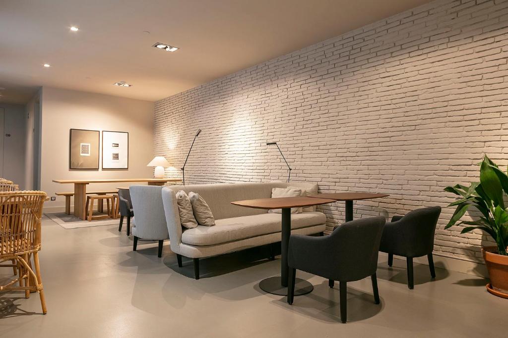 Posezení v ubytování Uma Suites Pau Claris