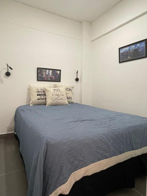 Cama ou camas em um quarto em Departamento Calle Vicente Zapata