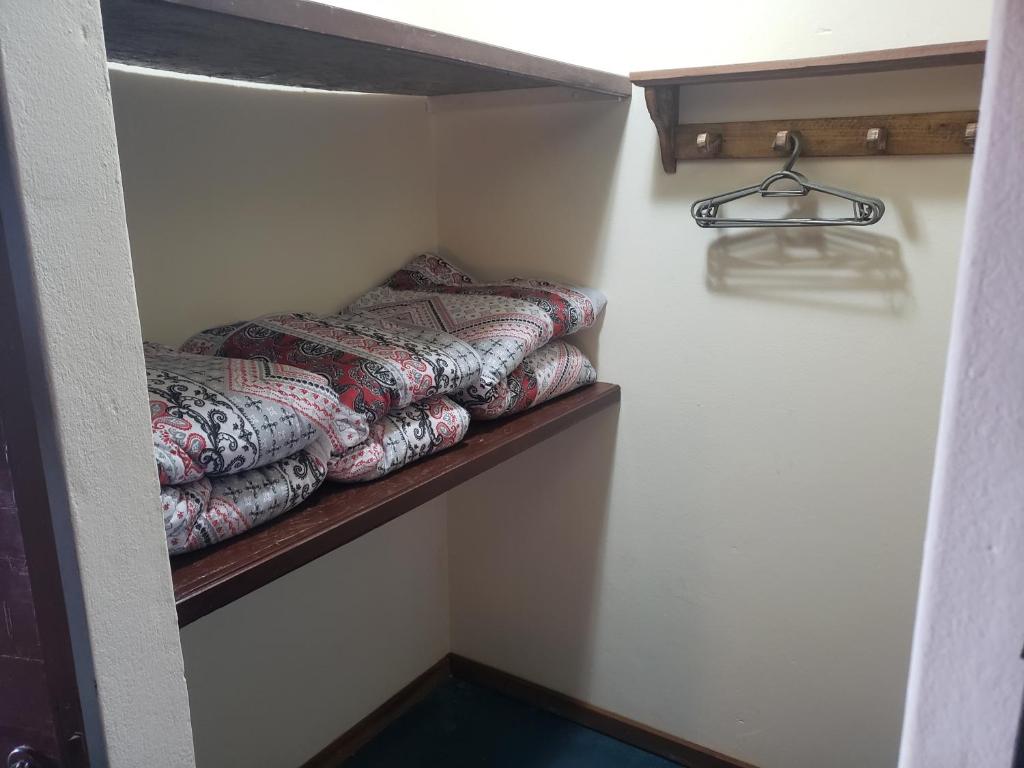 Postel nebo postele na pokoji v ubytování Chalés Flor de Manacá