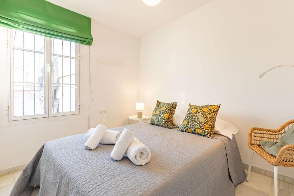 A bed or beds in a room at Mata Alameda Skyview by Valcambre