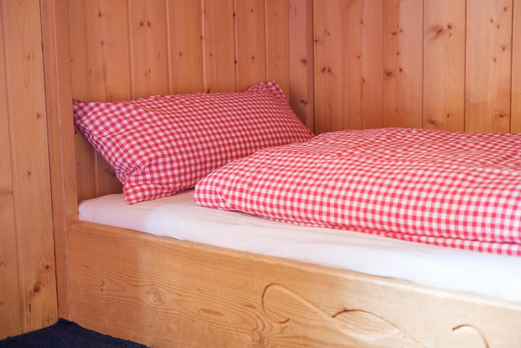 Postel nebo postele na pokoji v ubytování Berggasthof Hörnerhaus