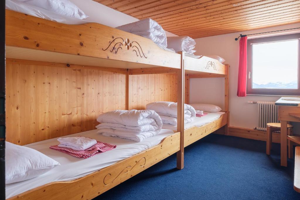Postel nebo postele na pokoji v ubytování Berggasthof Hörnerhaus
