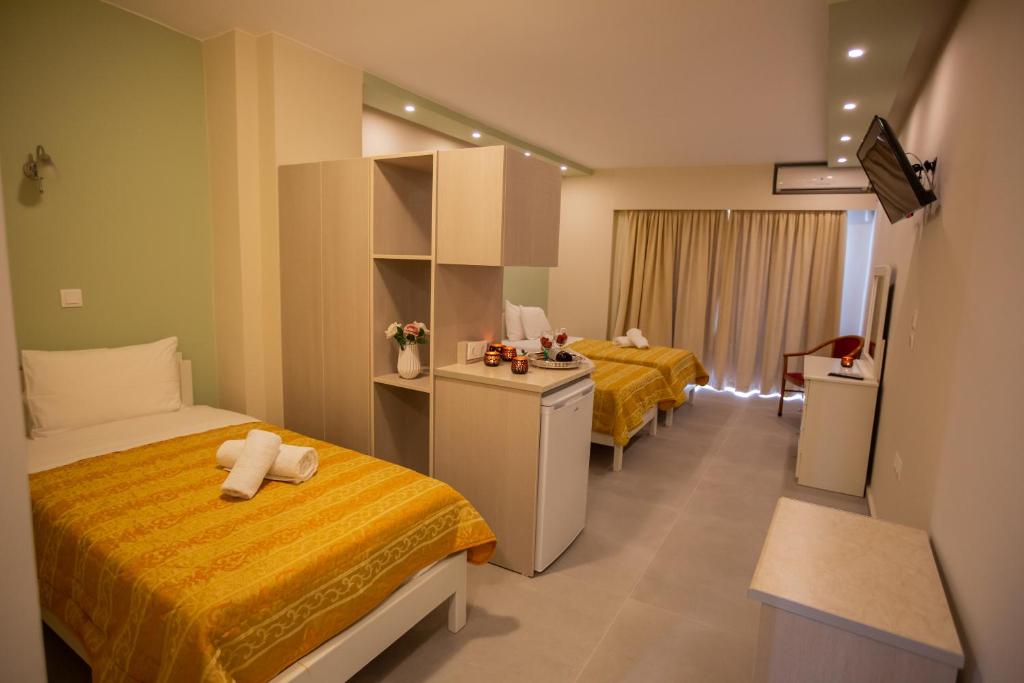 Postel nebo postele na pokoji v ubytování goldenbeach