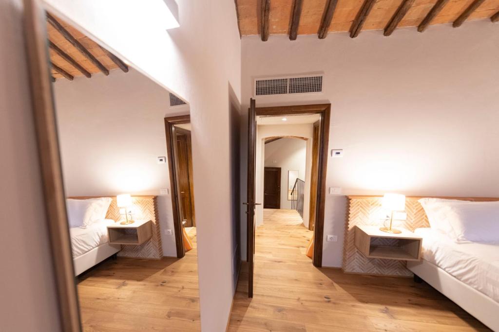Posteľ alebo postele v izbe v ubytovaní Villa Barberino