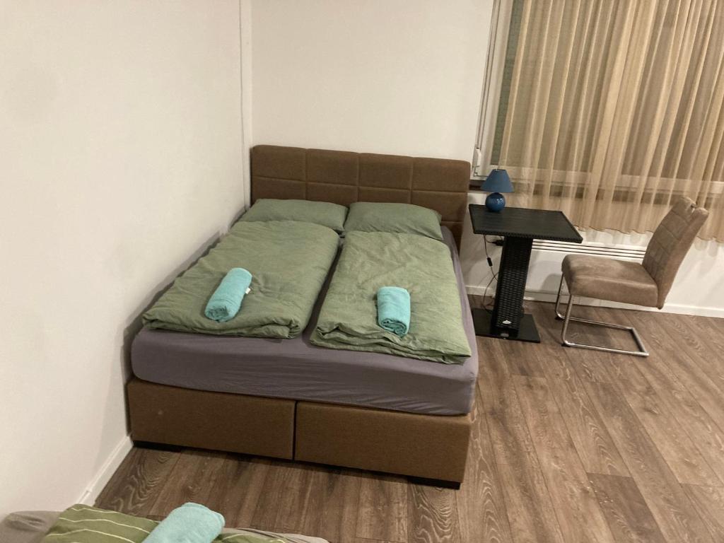 Posteľ alebo postele v izbe v ubytovaní Roland Apartment Zuglo 2