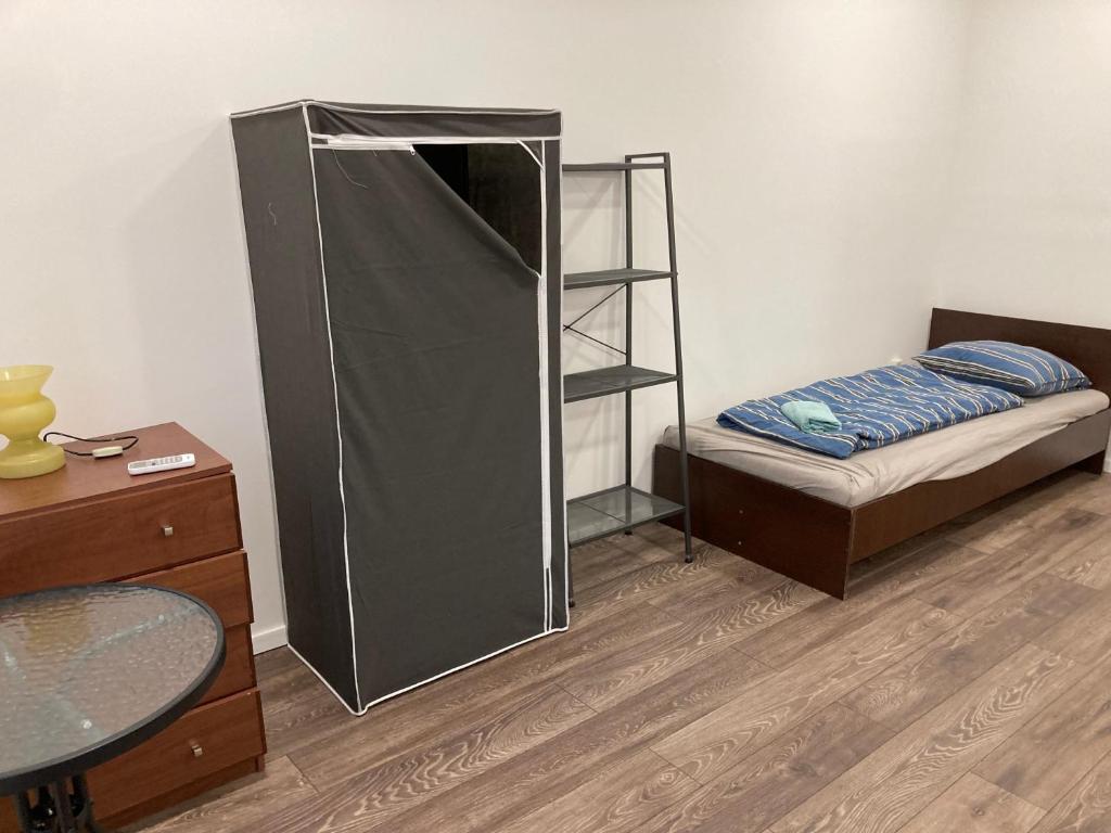Posteľ alebo postele v izbe v ubytovaní Roland Apartment Zuglo 2