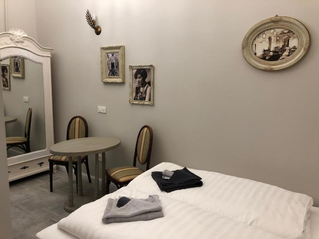 Posteľ alebo postele v izbe v ubytovaní All In Apartman IV.