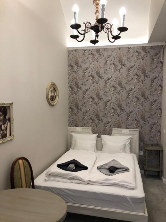 Posteľ alebo postele v izbe v ubytovaní All In Apartman IV.
