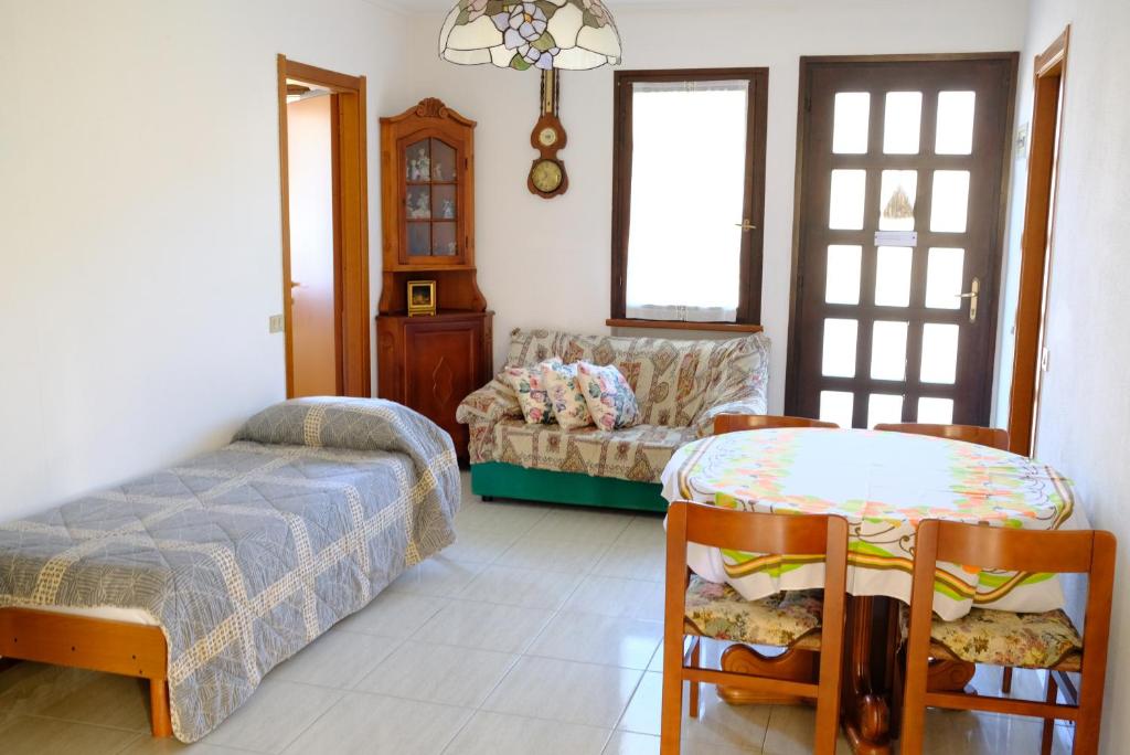 Postel nebo postele na pokoji v ubytování Hotel Il Canneto
