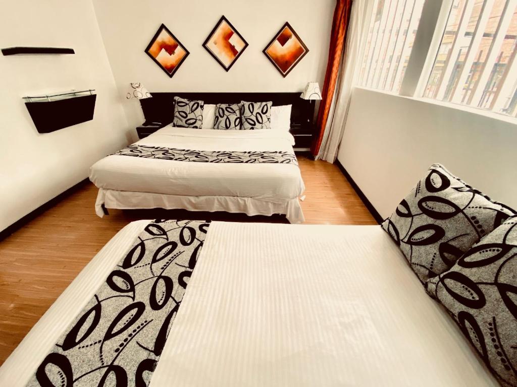 Postel nebo postele na pokoji v ubytování Hotel Marbella Chico