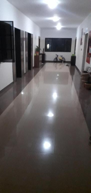 a large empty room with a large white floor at Brookefield Service Apartment in Bangalore
