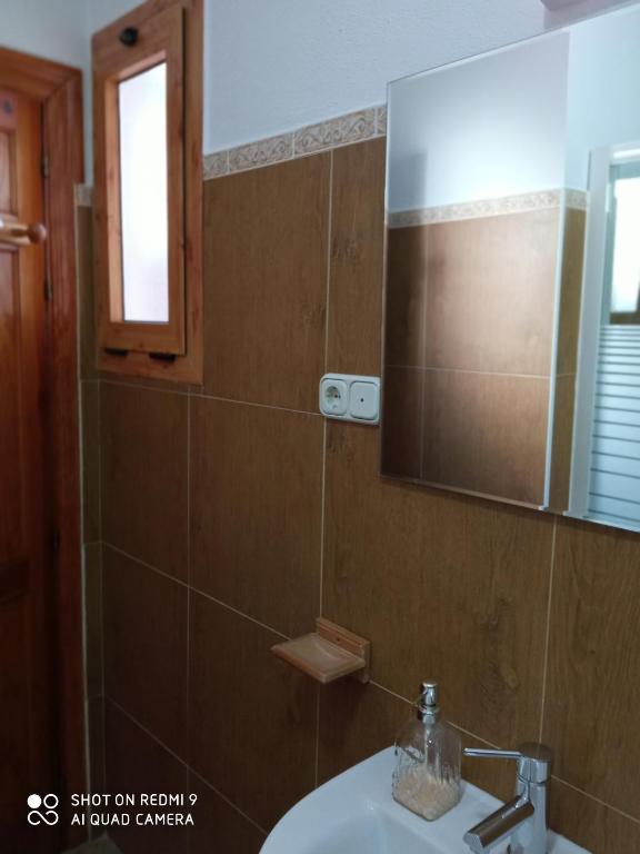 Koupelna v ubytování Apartamentos Virgen de Villaverde