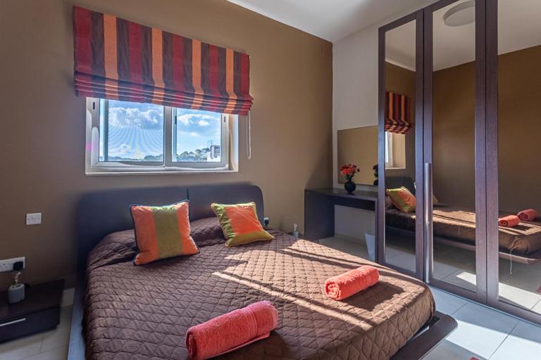Letto o letti in una camera di Waters-Edge Complex