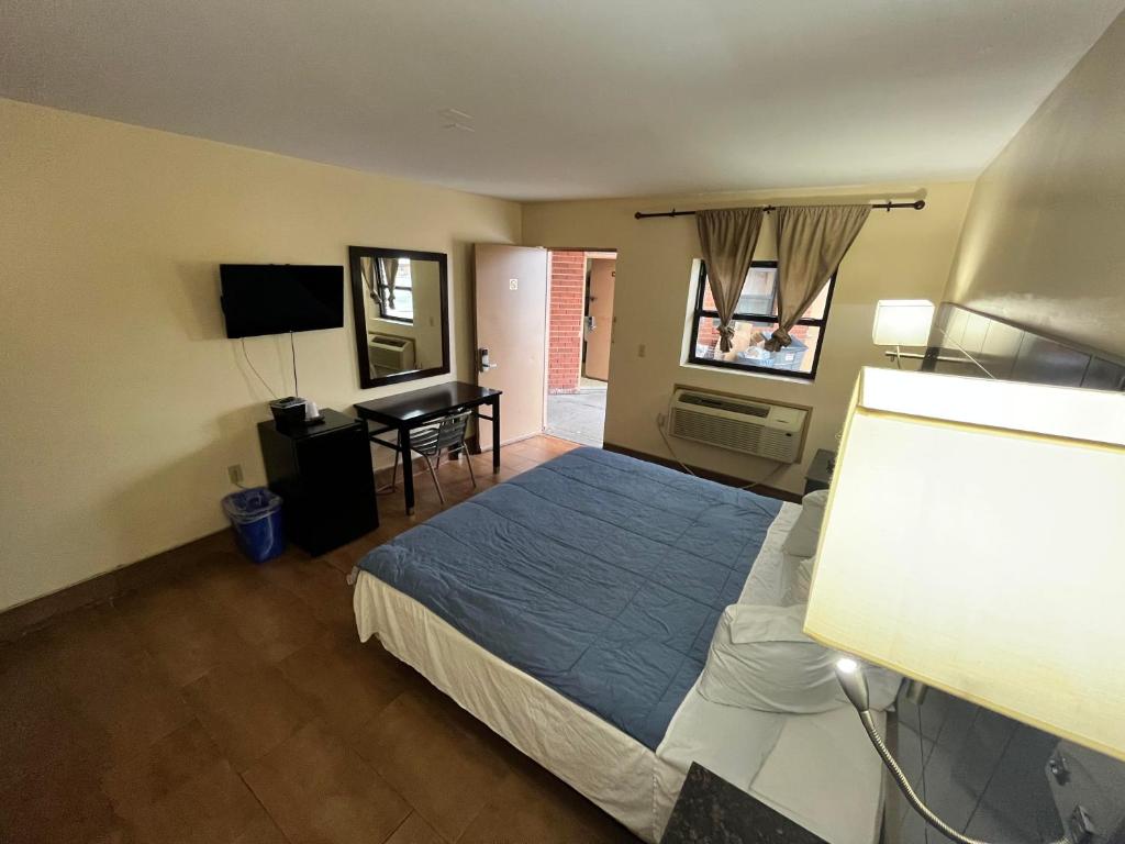 TV a/nebo společenská místnost v ubytování Circle Motor Lodge