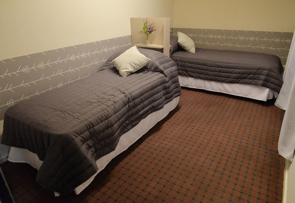 Postel nebo postele na pokoji v ubytování HOSTEL KUYUK