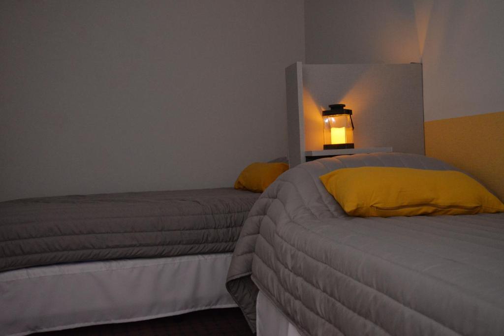 Postel nebo postele na pokoji v ubytování HOSTEL KUYUK