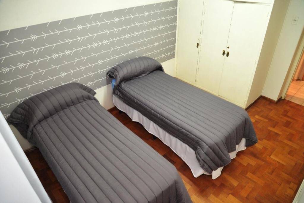 Postel nebo postele na pokoji v ubytování HOSTEL KUYUK