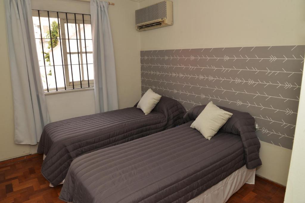 Postel nebo postele na pokoji v ubytování HOSTEL KUYUK