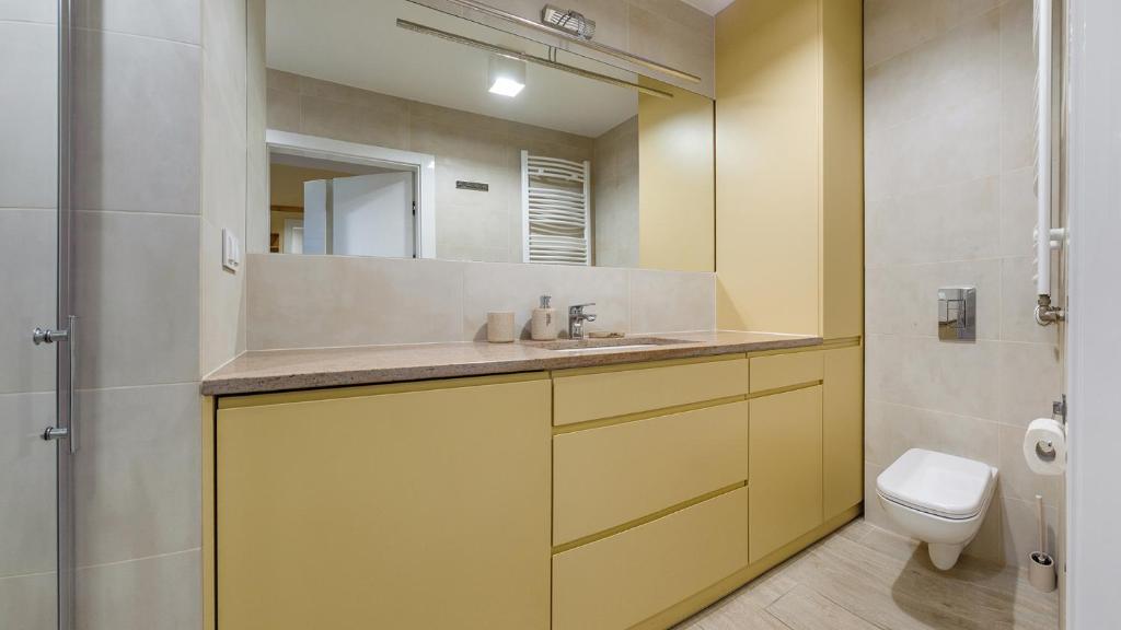 Kúpeľňa v ubytovaní Apartamenty Holiday City - Perłowa Przystań