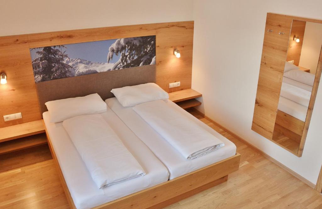 Postel nebo postele na pokoji v ubytování Appartement Schneekristall