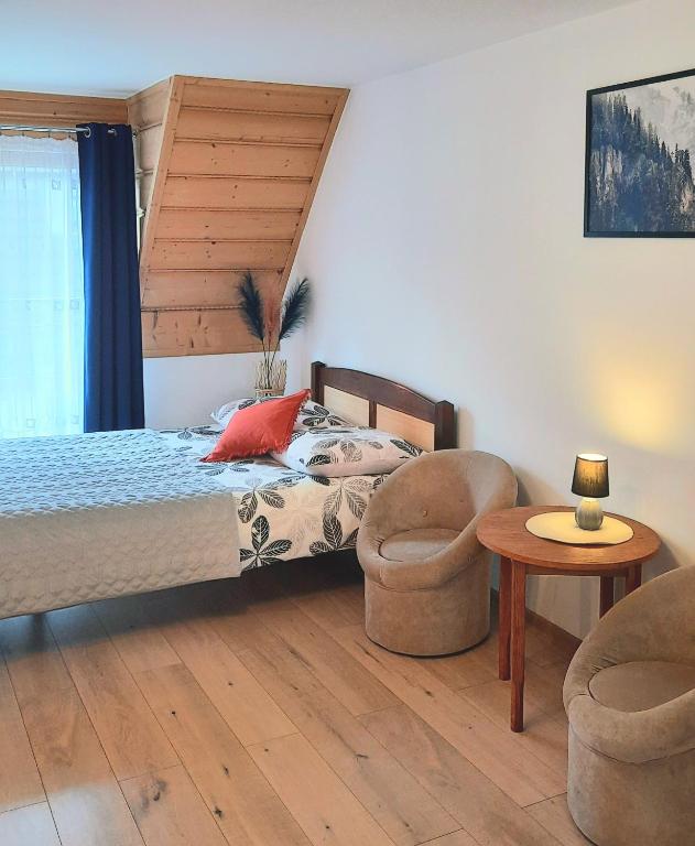 Posteľ alebo postele v izbe v ubytovaní Apartament dwupoziomowy u Samków