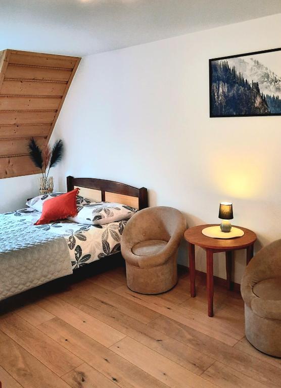 Posteľ alebo postele v izbe v ubytovaní Apartament dwupoziomowy u Samków