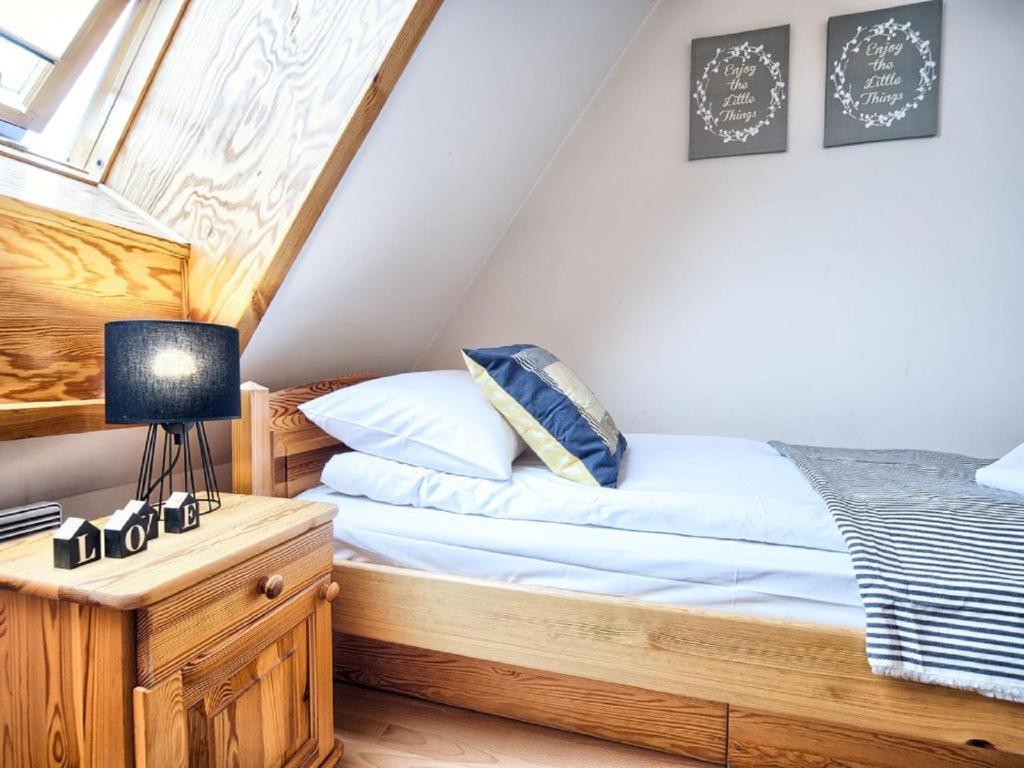 Posteľ alebo postele v izbe v ubytovaní Apart4Sleepers Apartament Dwupoziomowy Pardałówka