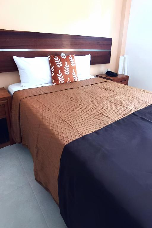 Postel nebo postele na pokoji v ubytování Hotel Boketto