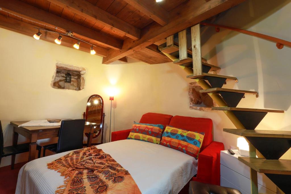 Postel nebo postele na pokoji v ubytování Antico Trullo Salentino