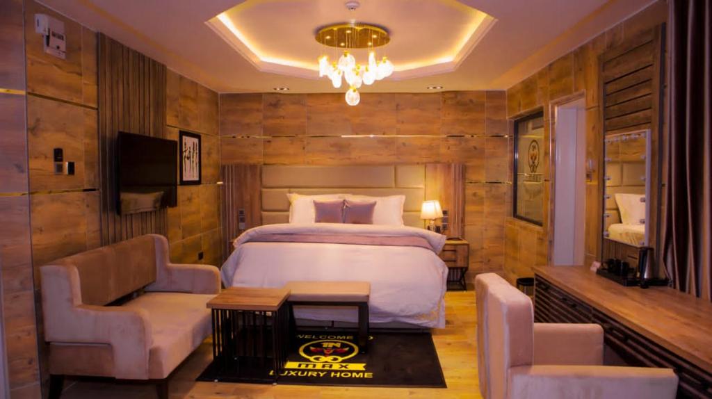 Postel nebo postele na pokoji v ubytování TN MAX LUXURY HOME