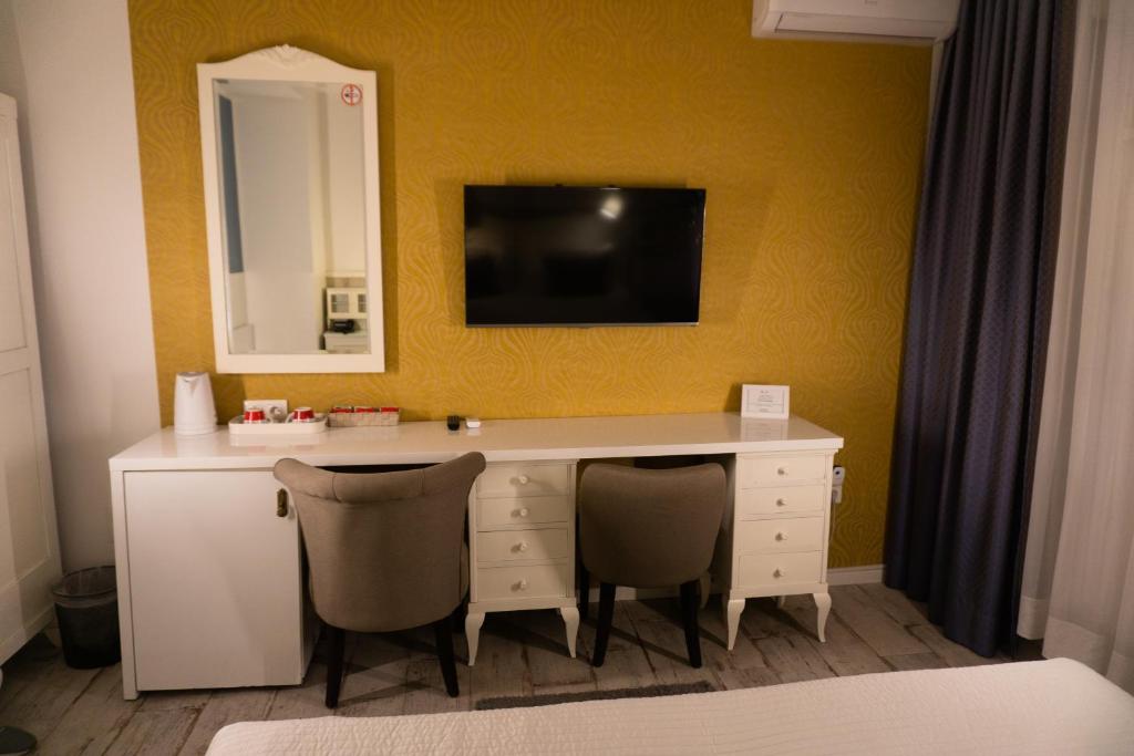 TV a/nebo společenská místnost v ubytování Hotel Divan