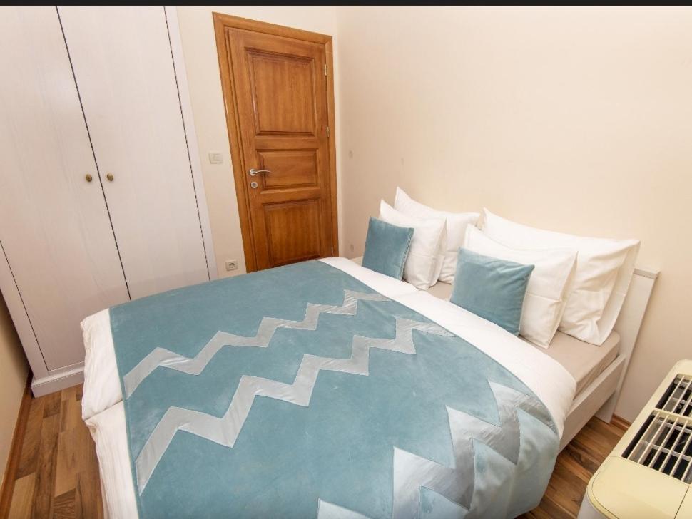Posteľ alebo postele v izbe v ubytovaní Apartmani Dubrava