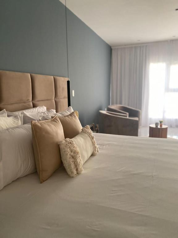 Postel nebo postele na pokoji v ubytování 25 homeApart