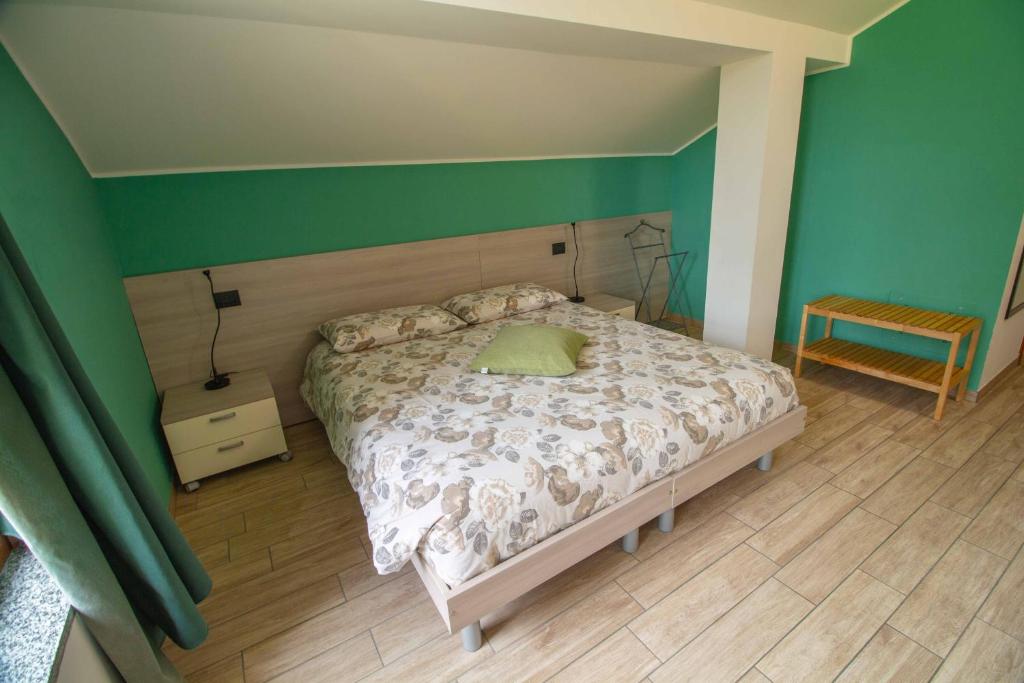 Postel nebo postele na pokoji v ubytování B&B Alla Roggetta