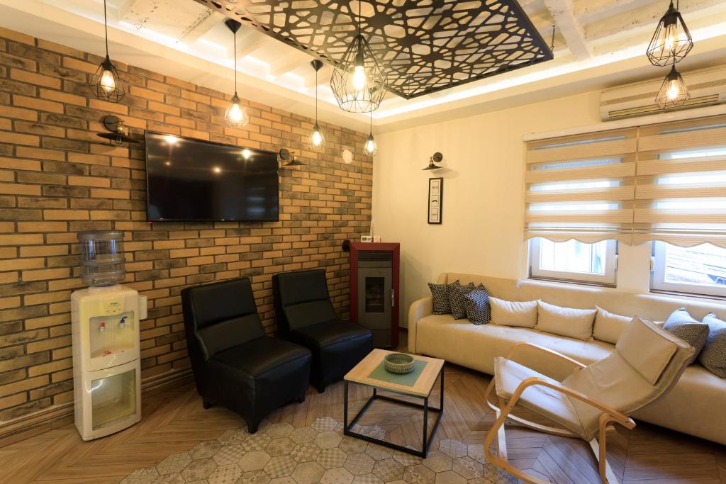 TV a/nebo společenská místnost v ubytování Hotel Elements