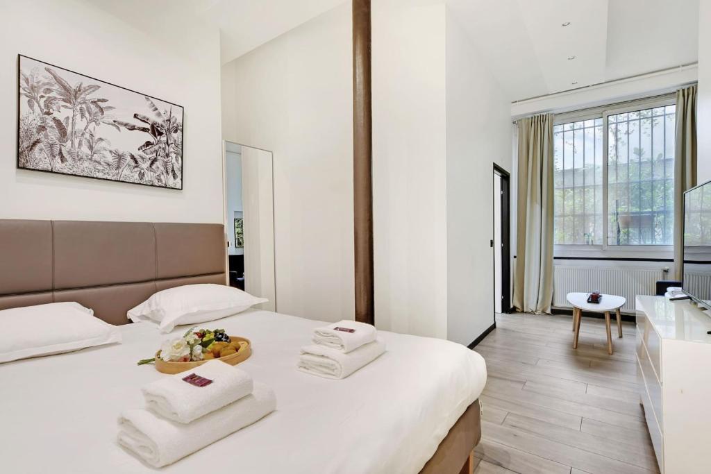 Posteľ alebo postele v izbe v ubytovaní Chic apartment - 3BR-8P - Le Marais
