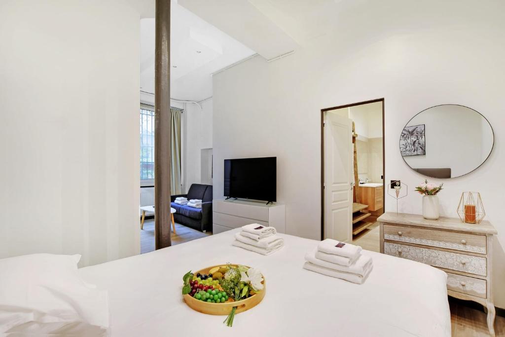 Televízia a/alebo spoločenská miestnosť v ubytovaní Chic apartment - 3BR-8P - Le Marais