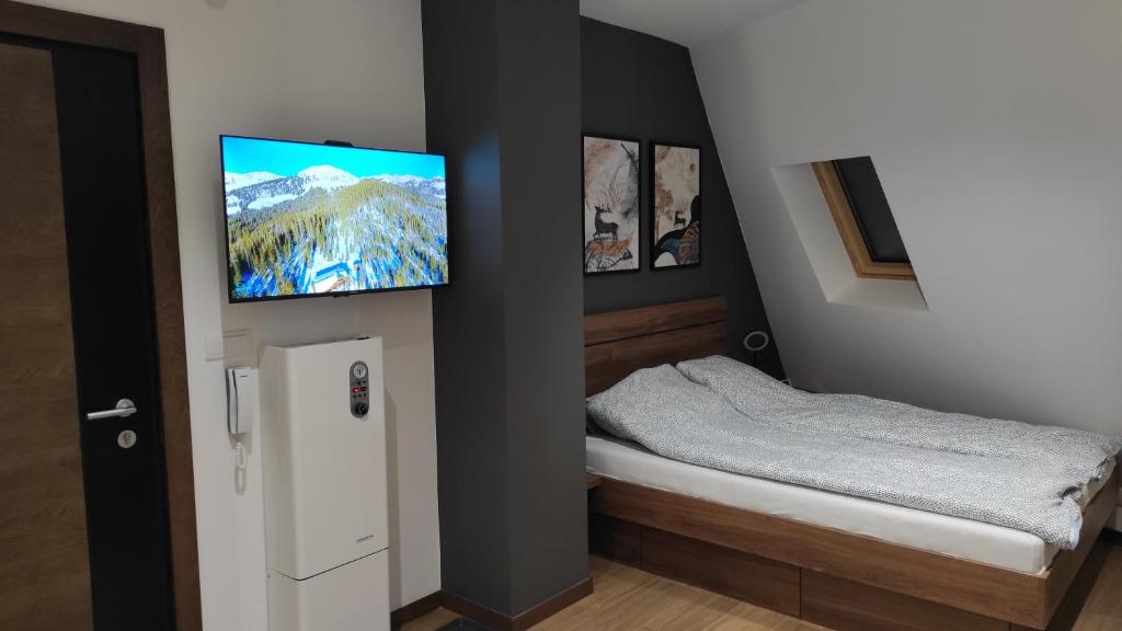 Postel nebo postele na pokoji v ubytování Dva Jelena