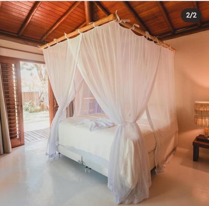 Postel nebo postele na pokoji v ubytování Camauí Hotel