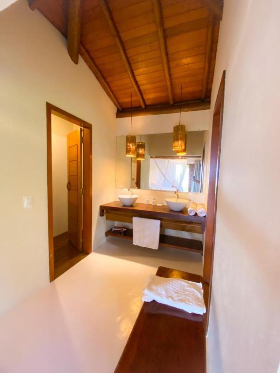 Postel nebo postele na pokoji v ubytování Camauí Hotel
