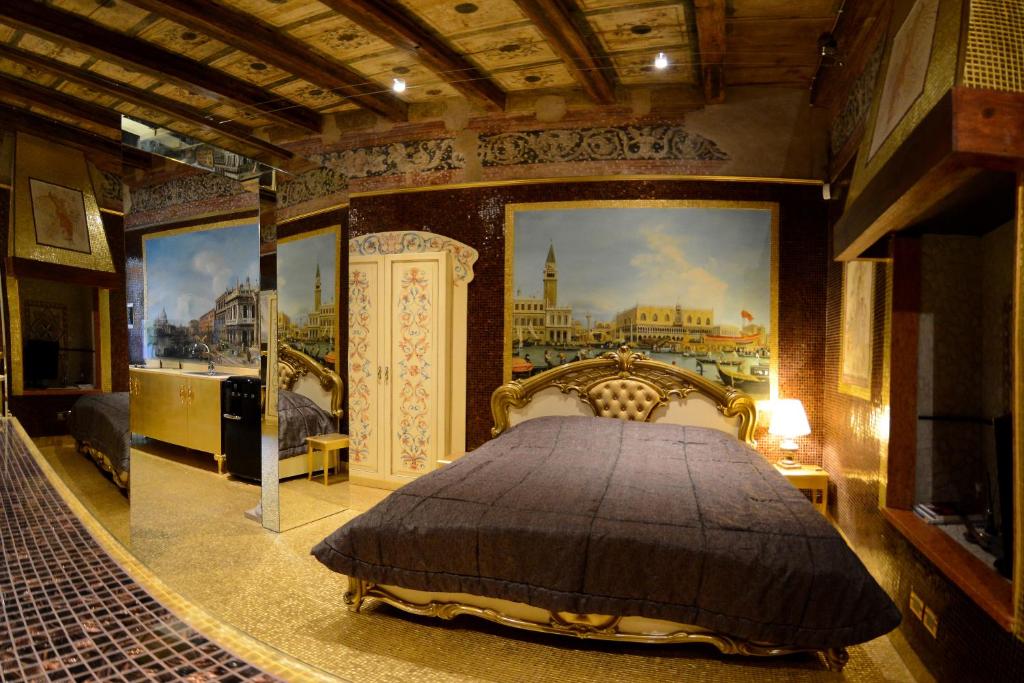 Una cama o camas en una habitación de Il MOSAICO piccola spa