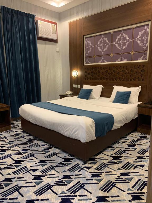 Postel nebo postele na pokoji v ubytování قست العصر للشقق المخدومة guest Aleasr Serviced Aprtments